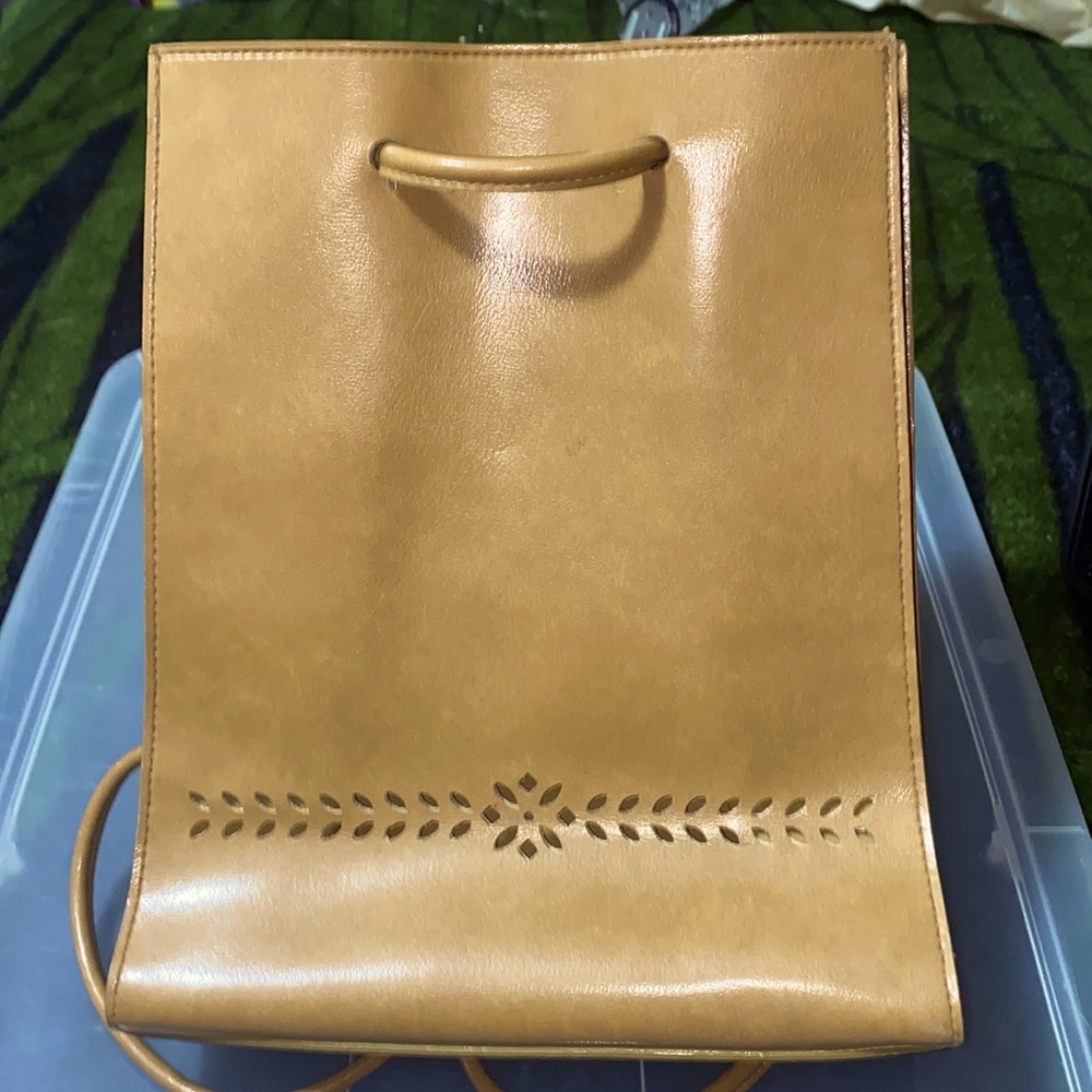 Tan Vintage Mondani New York backpack.